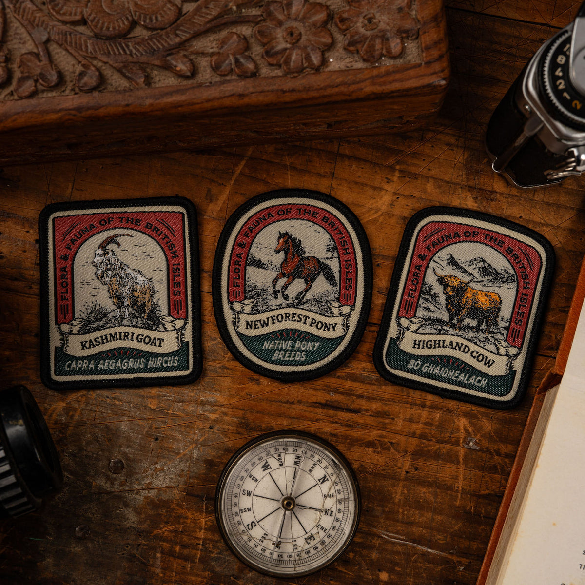 Highland Cow patch lifestyle shot - retro woven Scottish wildlife patch on outdoor gear