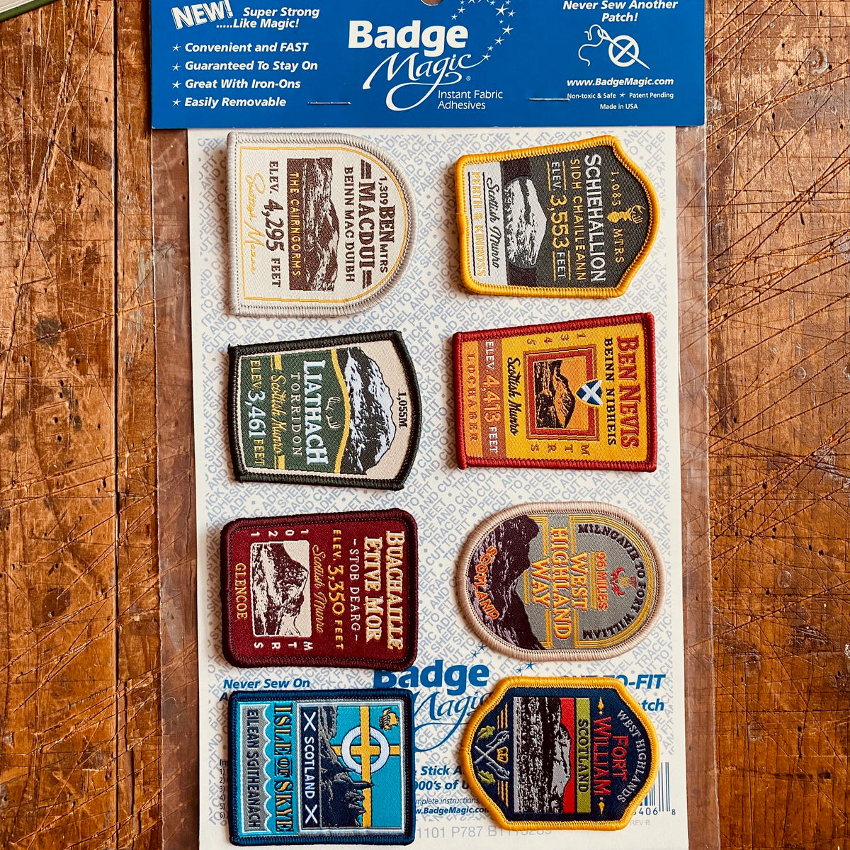 Badge Magic adhesive sheet in use on a patch - cut to fit adhesive for iron-on or stick-on application