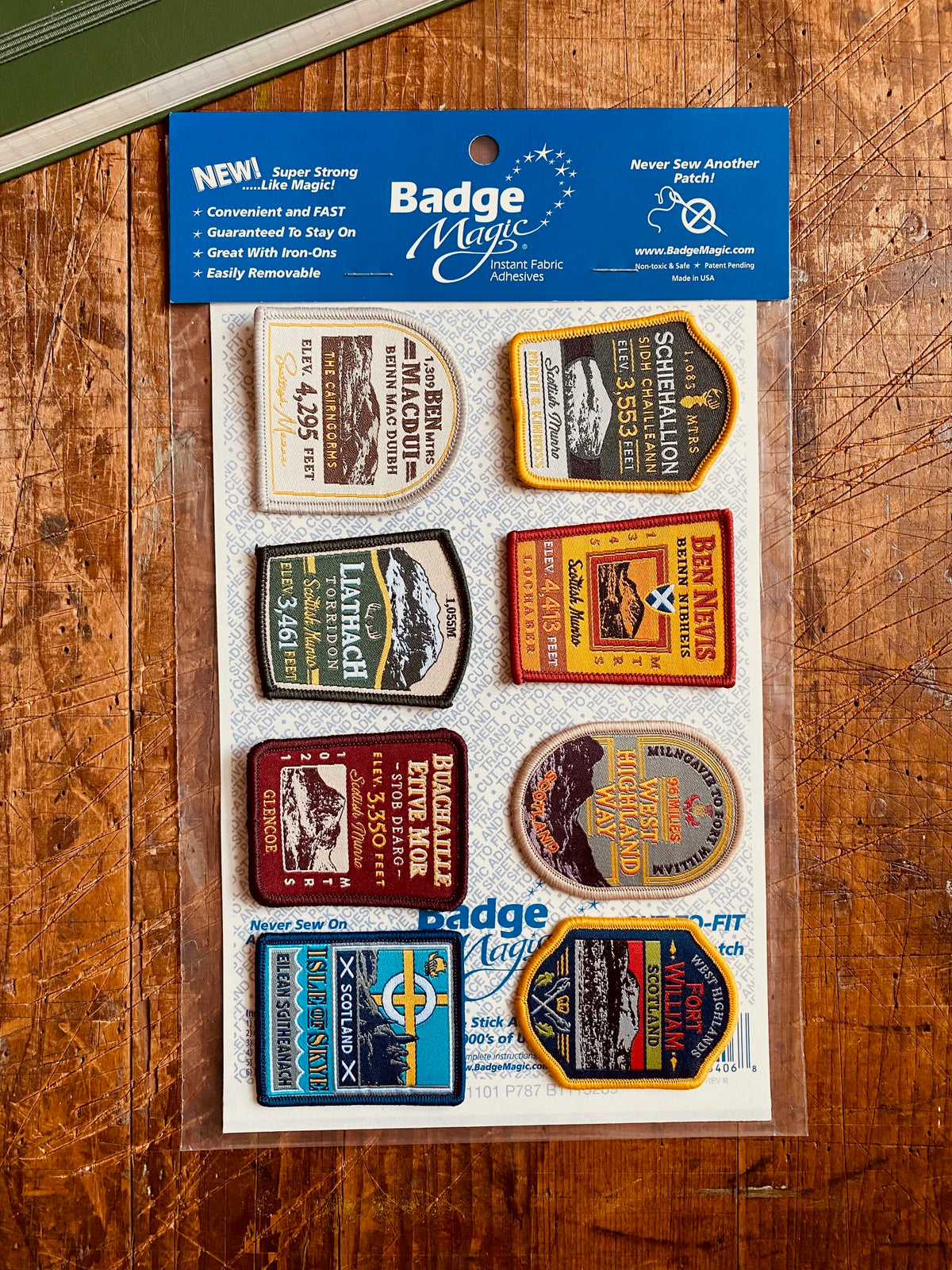 Badge Magic adhesive sheet in use on a patch - cut to fit adhesive for iron-on or stick-on application
