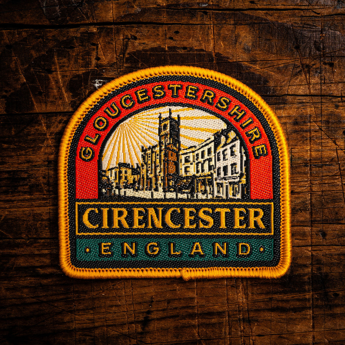 Cirencester retro woven patch - historic Cotswolds market town in Gloucestershire, iron-on backing