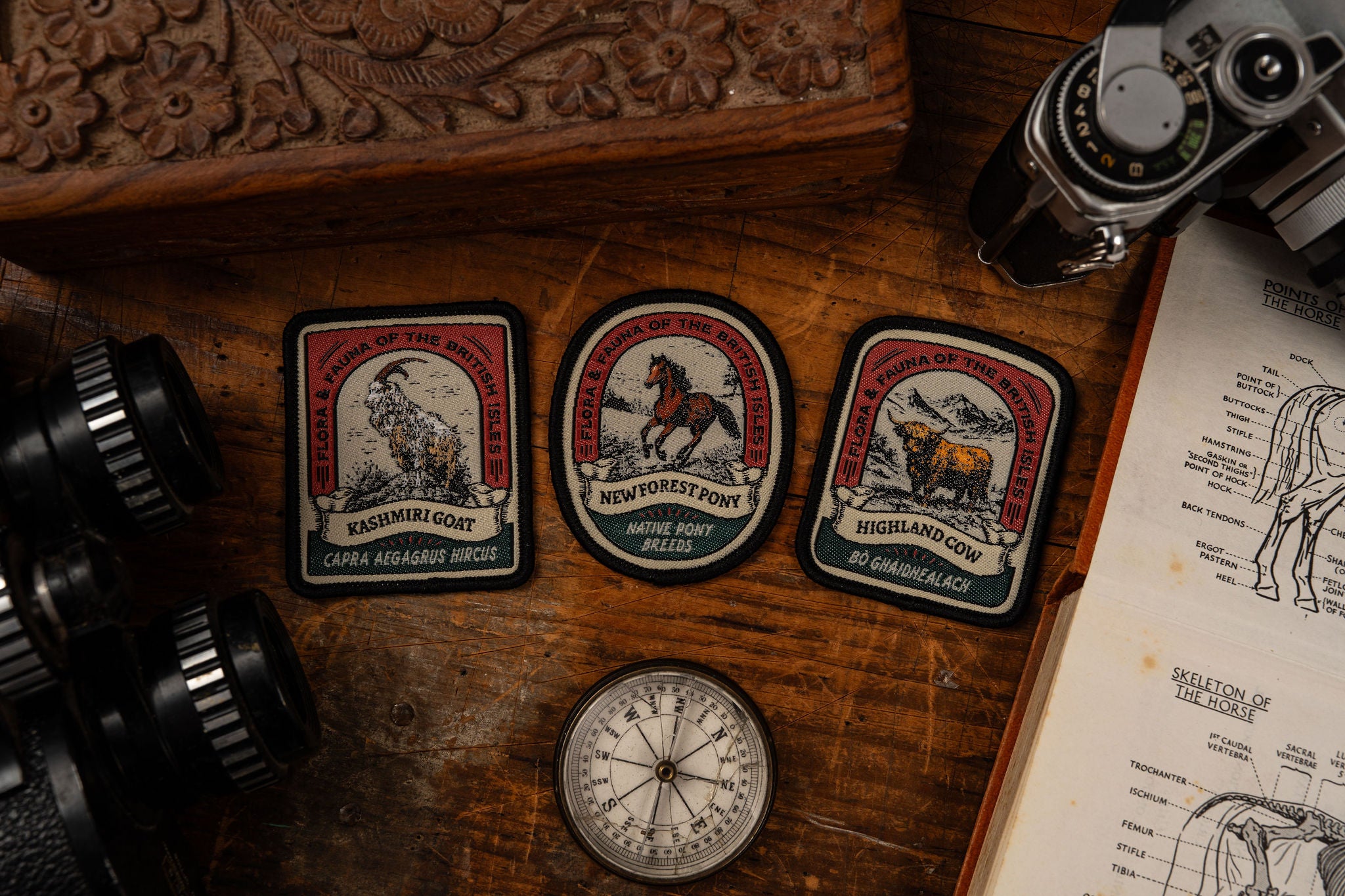 Highland Cow patch lifestyle shot - retro woven Scottish wildlife patch on outdoor gear