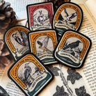 Great Spotted Woodpecker patch lifestyle shot on outdoor gear - retro woven British wildlife patch
