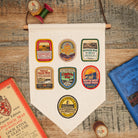 Adventure Patch Company flag pennant hanging display - promotional pennant for outdoor brands