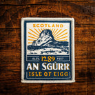 An Sgurr (Eigg) retro woven patch - iconic basalt pinnacle on Isle of Eigg, Scotland, whisky label design