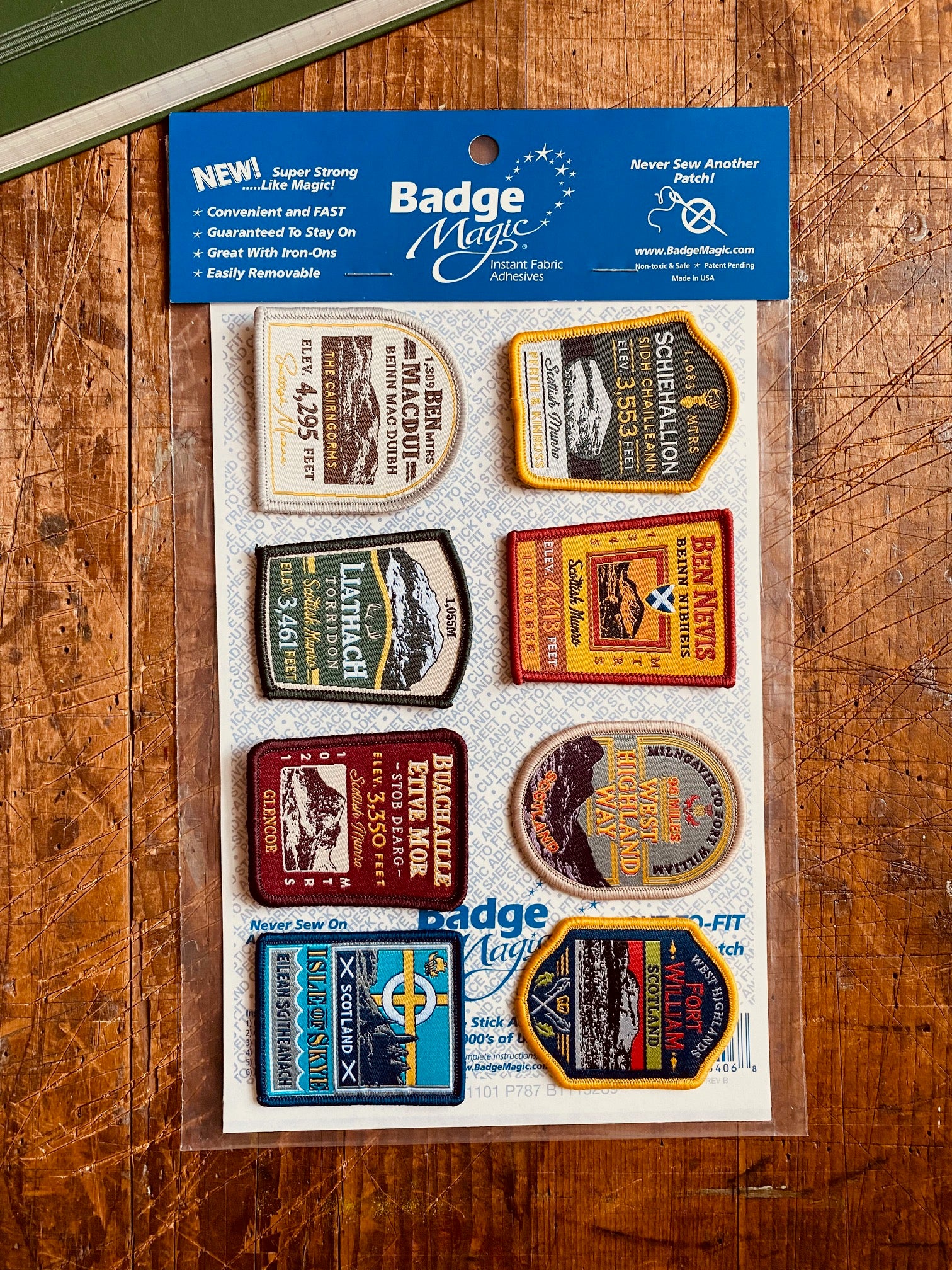 Badge Magic adhesive sheet in use on a patch - cut to fit adhesive for iron-on or stick-on application