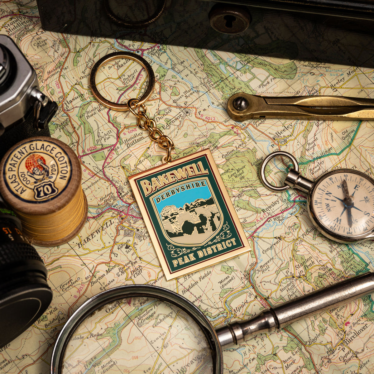 Bakewell hard enamel keyring - historic Peak District market town, pub sign design