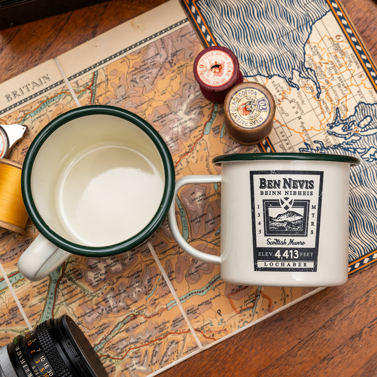 Ben Nevis camp mug lifestyle shot - hard enamel camping mug in outdoor setting