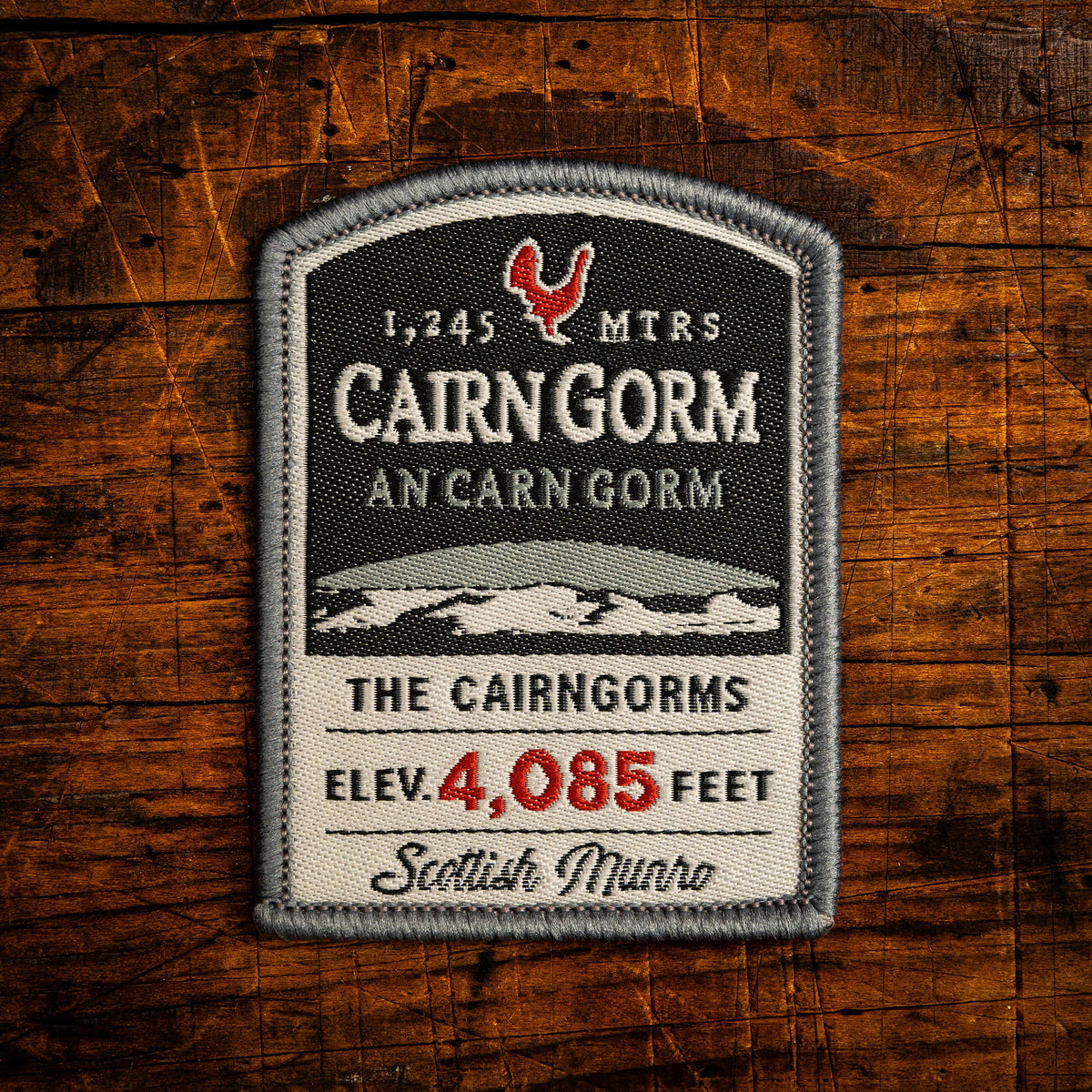 Cairn Gorm retro woven patch – iconic Cairngorms Munro, Scotland, whisky label design, iron-on backing