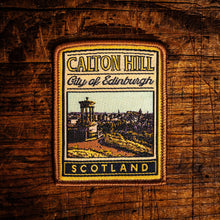 Load image into Gallery viewer, Calton Hill retro woven patch - Edinburgh's famous hilltop with panoramic city views, iron-on backing