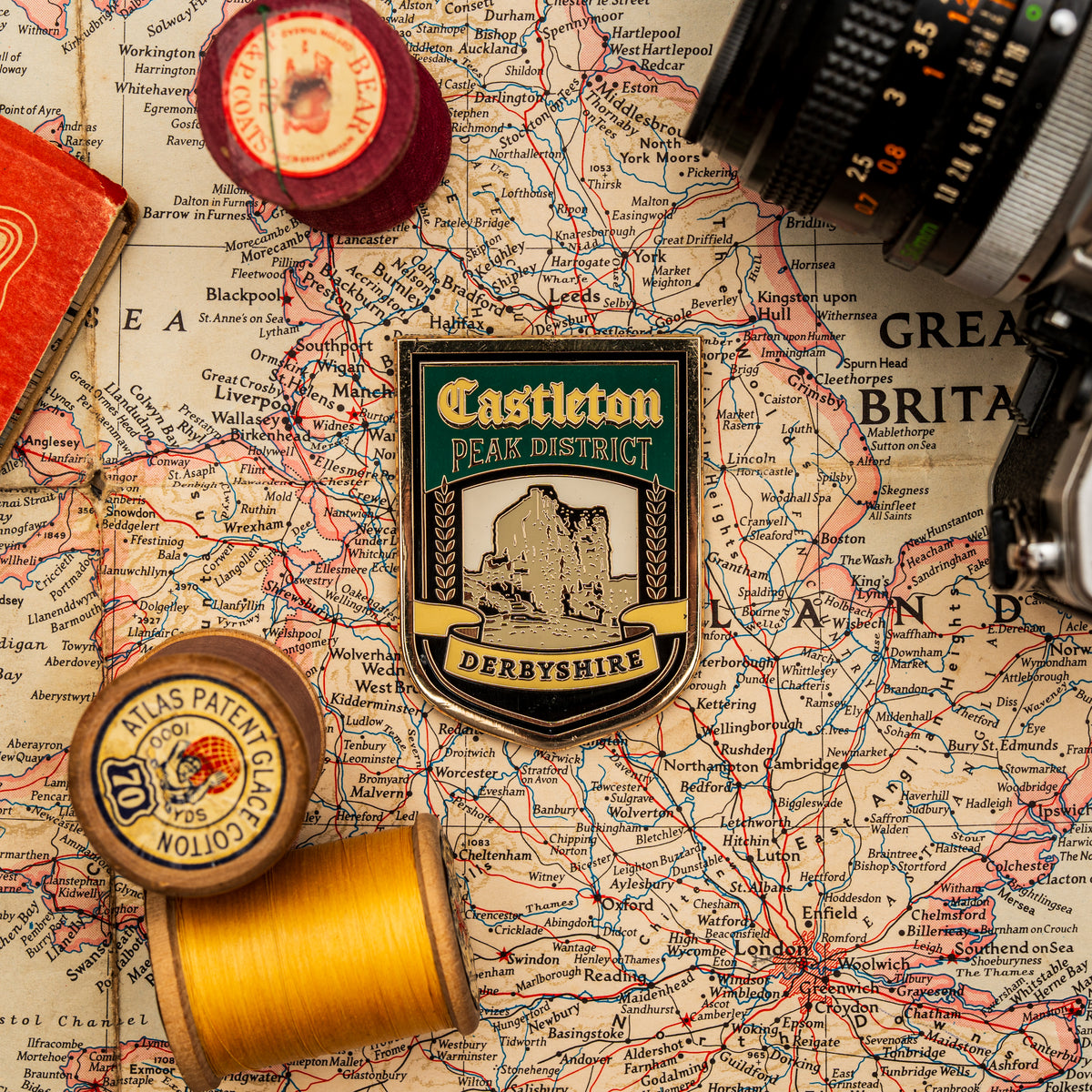 Castleton fridge magnet close-up detail - hard enamel magnetic keepsake for Peak District visitors