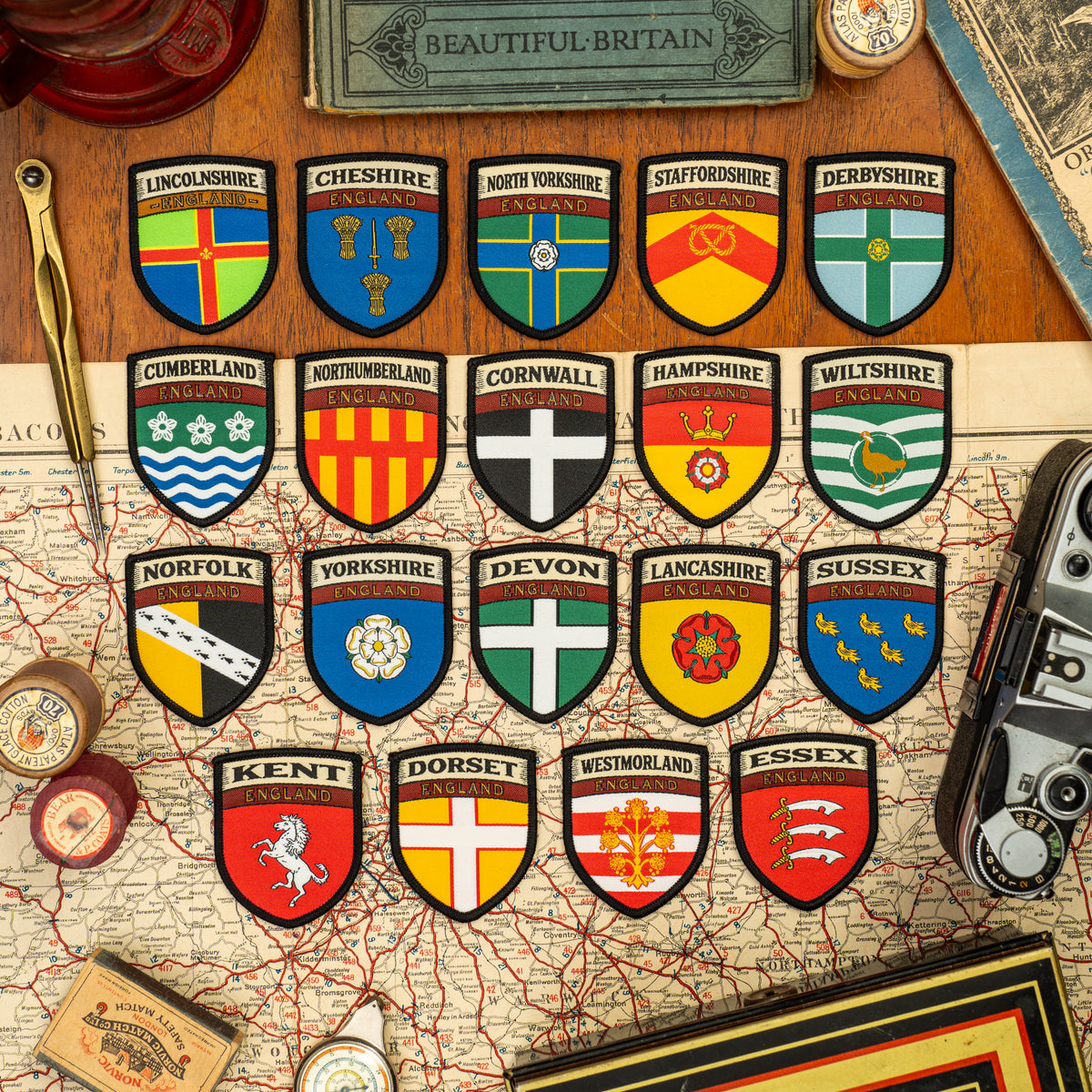 County flag patches on outdoor gear - retro woven patches celebrating English and UK counties