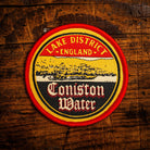 Coniston Water retro woven patch – beautiful Lake District lake, beer pump clip design, iron-on backing