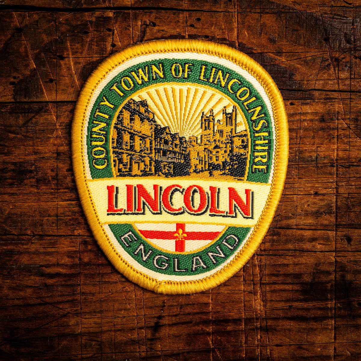 City of Lincoln retro woven patch - historic cathedral city in Lincolnshire, pub sign design, iron-on