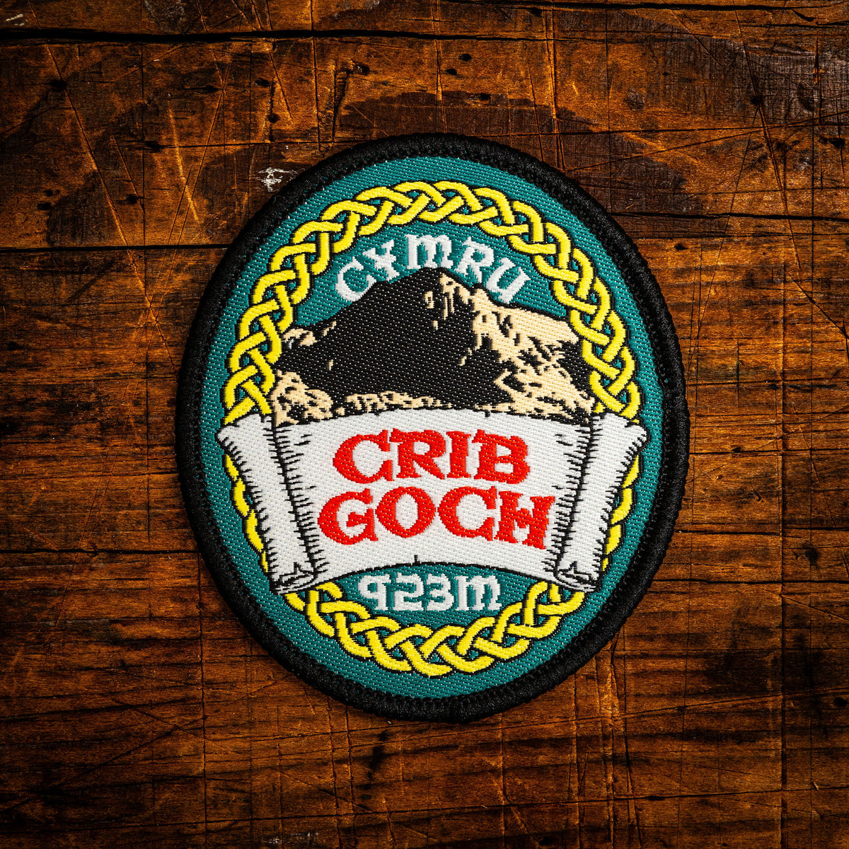 Crib Goch Celtic design woven patch – iconic knife-edge ridge mountain in Snowdonia, Wales, iron-on