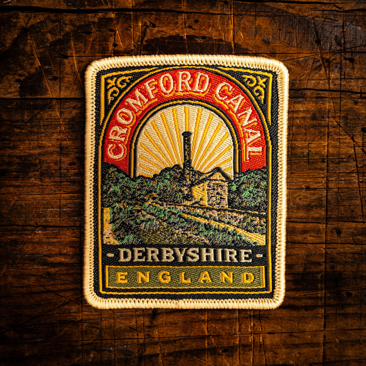 Cromford Canal retro woven patch - historic Peak District canal, pub sign design, iron-on backing