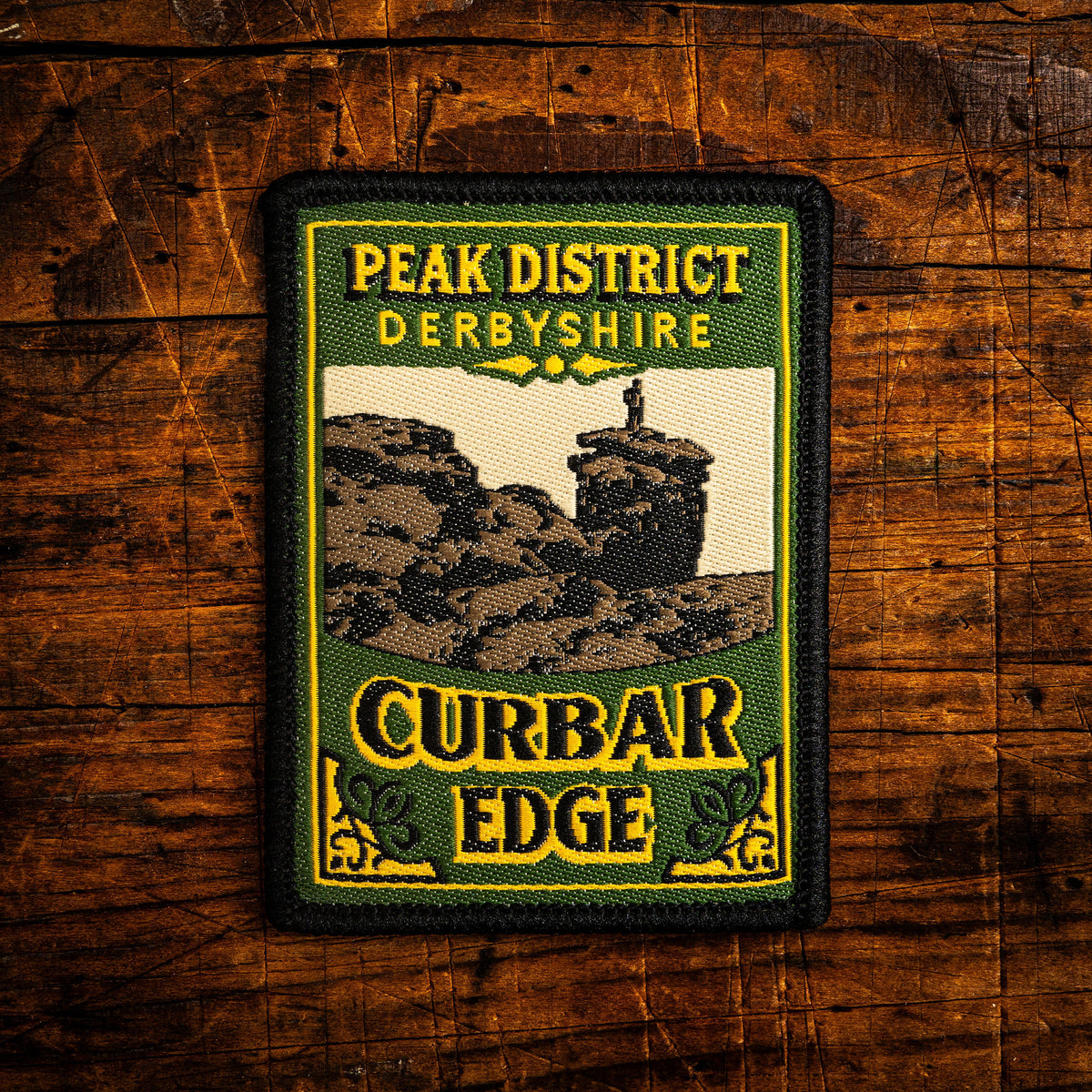 Curbar Edge retro woven patch – gritstone escarpment above Curbar, Peak District, pub sign design