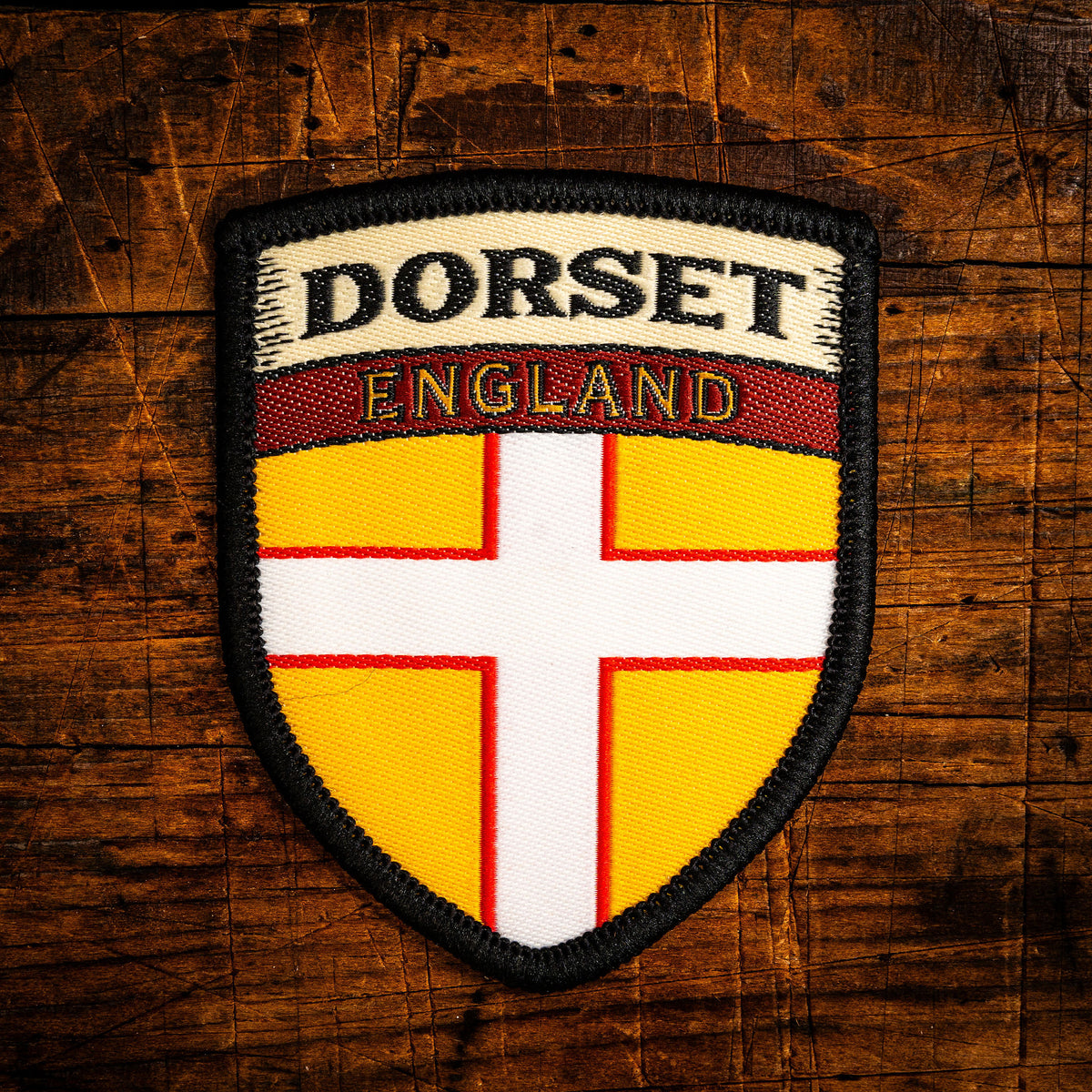 Dorset county flag retro woven patch - county flag of Dorset, England, iron-on backing, recycled yarn