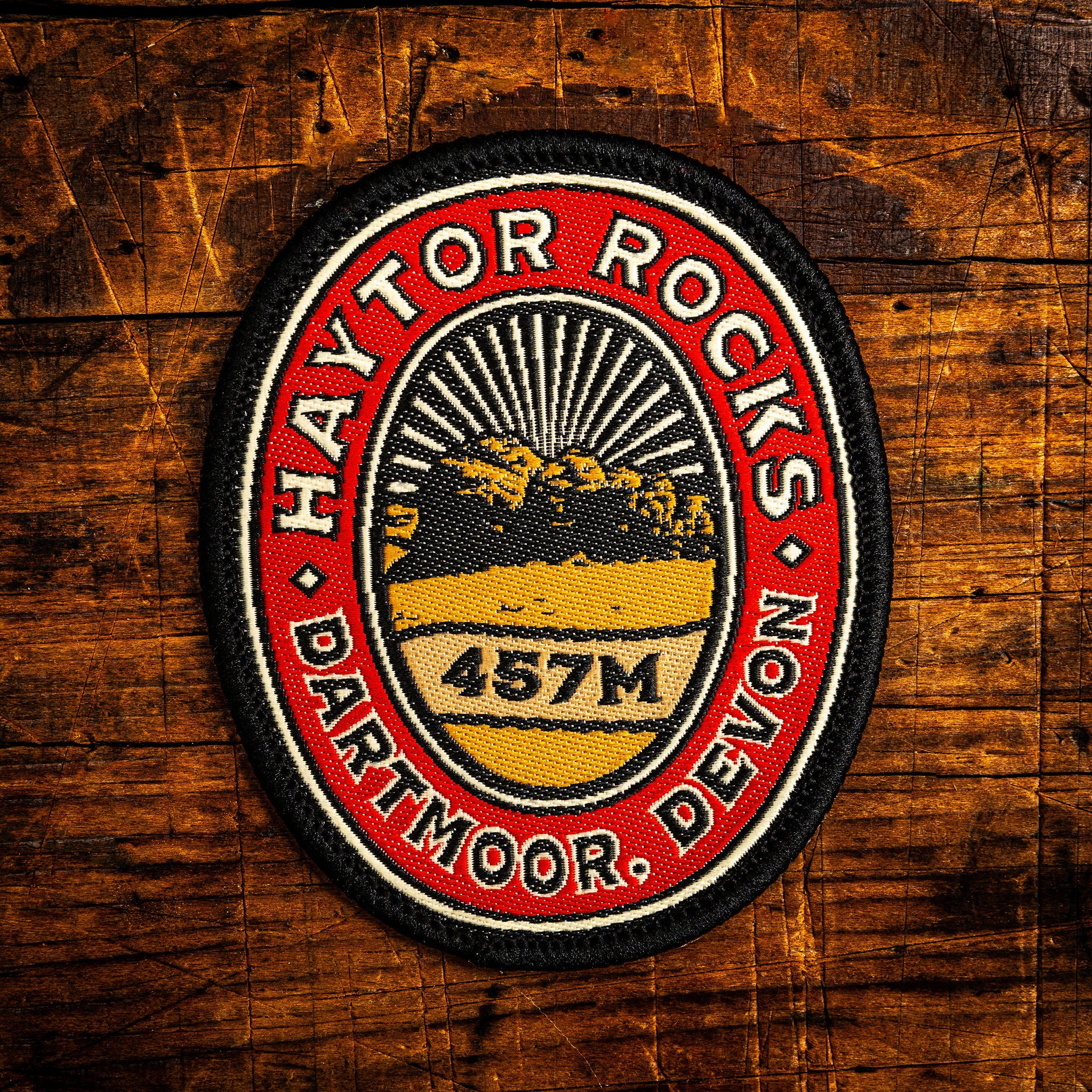 Haytor Rocks retro woven patch – iconic Dartmoor tor, iron-on backing, recycled yarn