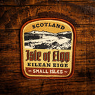 Isle of Eigg retro woven patch - beautiful Scottish island with distinctive An Sgurr, whisky label design, iron-on