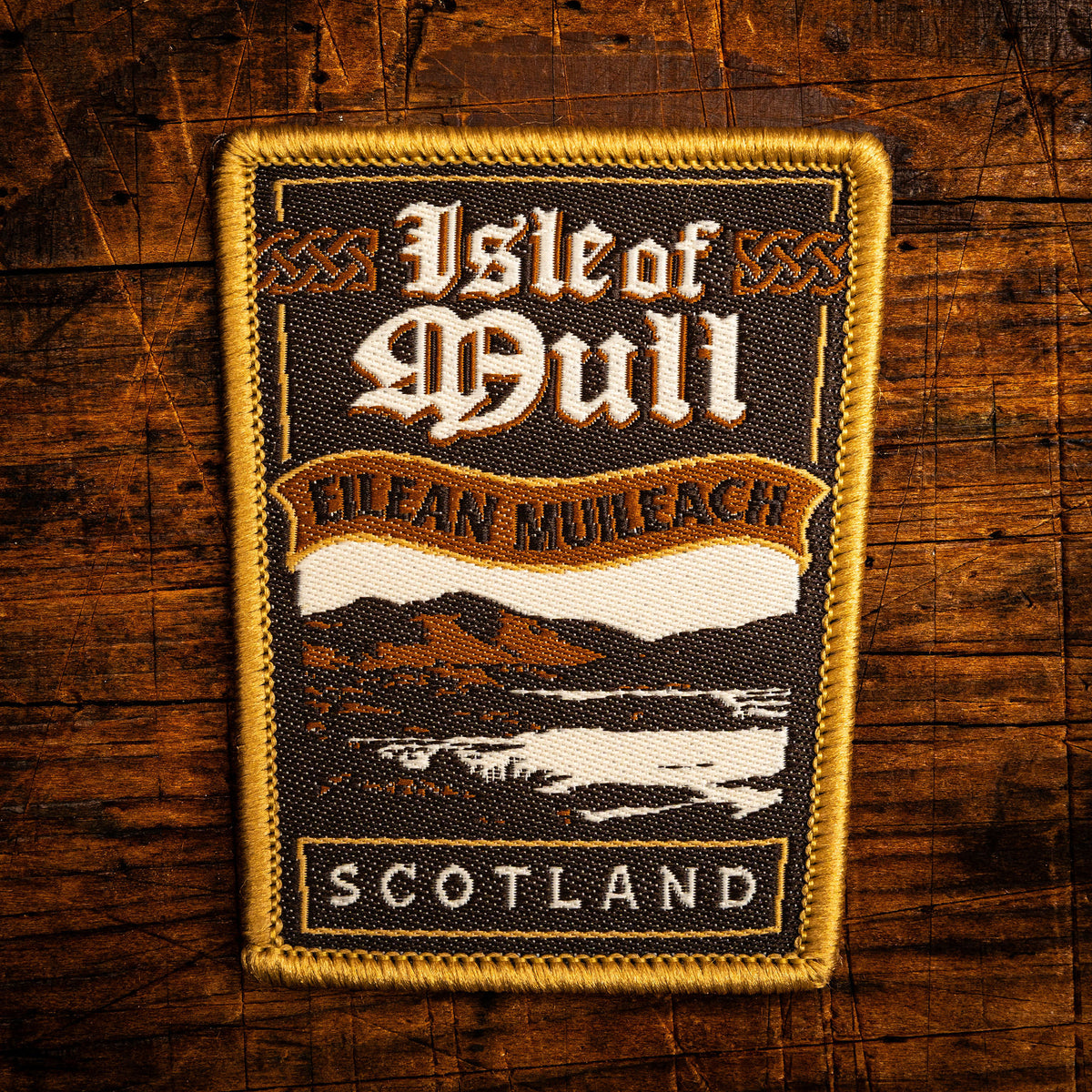 Isle of Mull retro woven patch – wild rugged Scottish island, whisky label design, iron-on backing