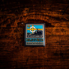 Isle of Skye hard enamel pin - enchanting Scottish island, whisky label design, butterfly clasp