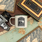 Isle of Rum camp mug lifestyle shot - hard enamel camping mug in outdoor setting
