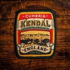 Kendal retro woven patch - historic Lake District market town, beer pump clip design, iron-on backing
