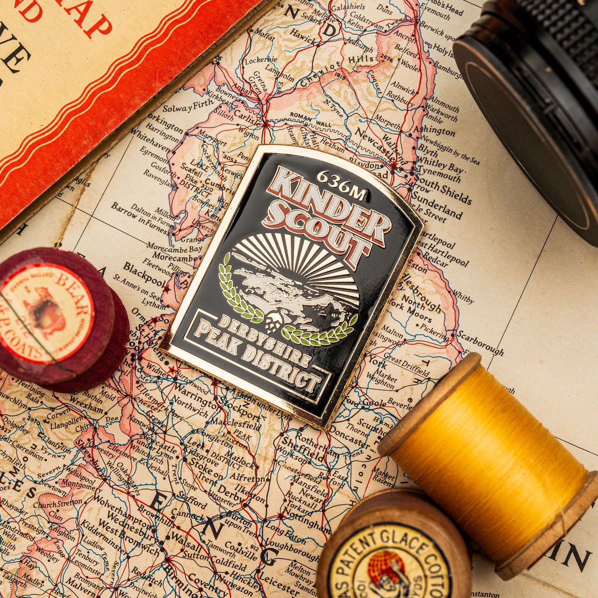Kinder Scout fridge magnet close-up - hard enamel magnetic keepsake for Peak District visitors