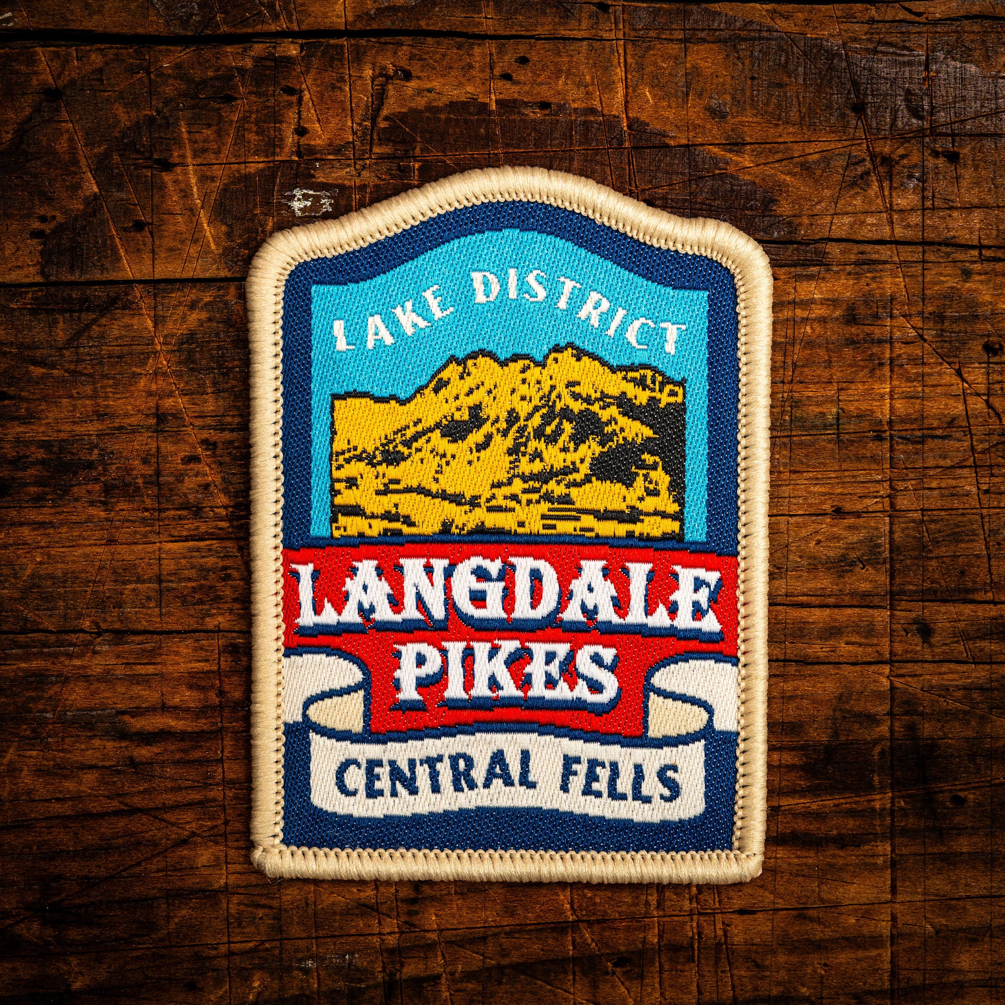 Langdale Pikes retro woven patch – iconic Lake District fell group, beer pump clip design, iron-on backing