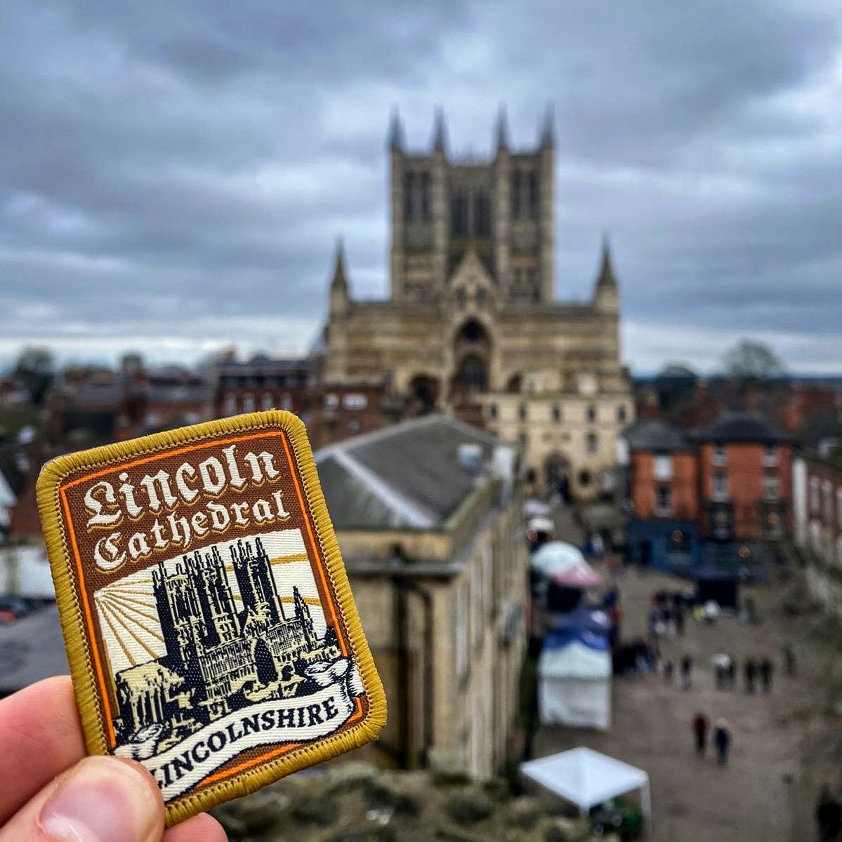 Lincolnshire patches flat-lay display with Lincoln Cathedral patch - retro woven collection