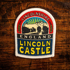 Lincoln Castle retro woven patch - historic Norman castle in Lincolnshire, pub sign design, iron-on
