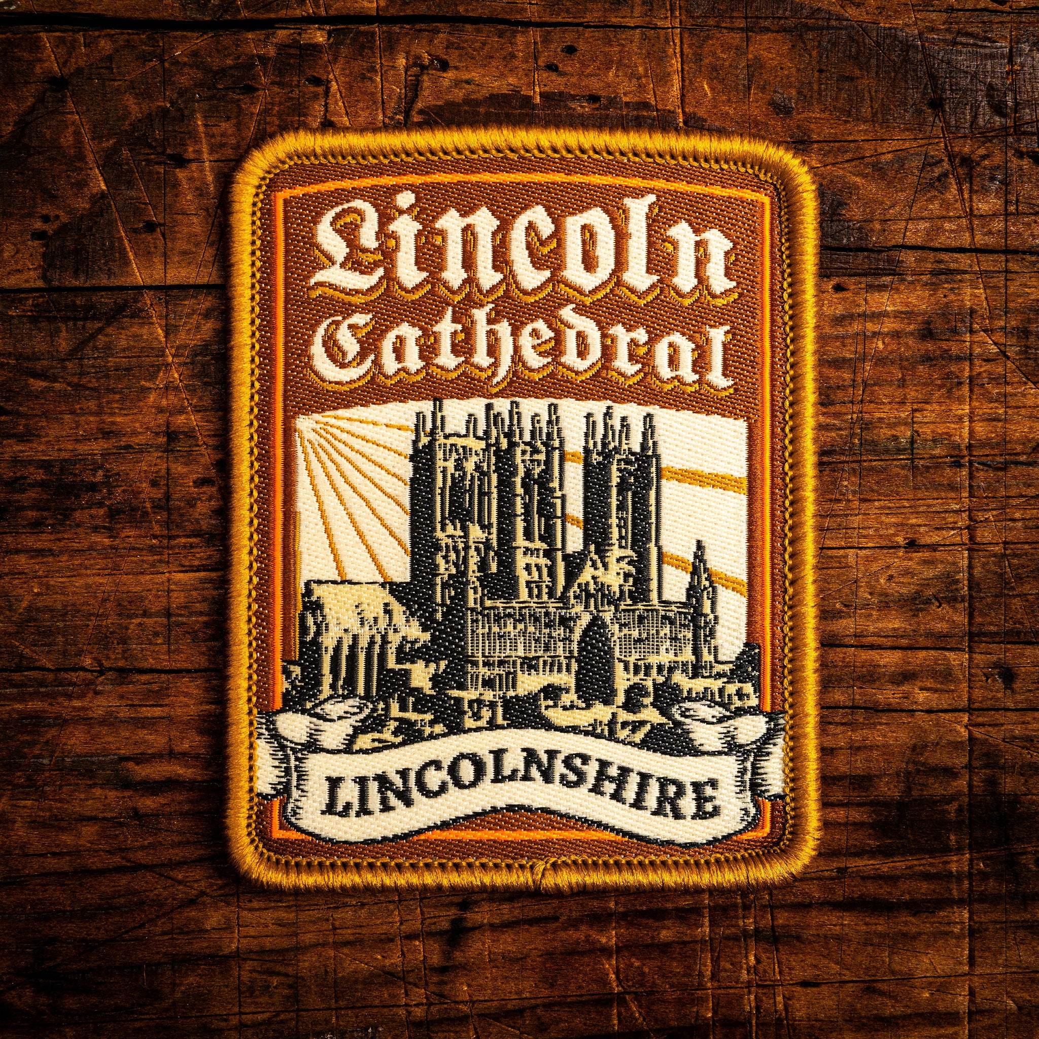 Lincoln Cathedral retro woven patch - iconic Gothic cathedral, historic Lincolnshire landmark, iron-on