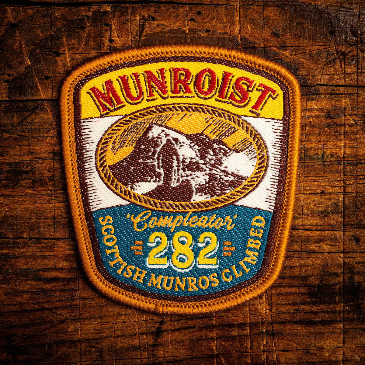 Munroist completer retro woven patch – celebrating climbing all 282 Munros in Scotland, iron-on backing