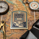 North Coast 500 hard enamel fridge magnet - iconic Scottish scenic route, whisky label design