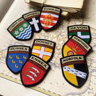 English county flag patches on outdoor gear including Hampshire - retro woven county flag patches