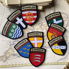 English county flag patches on outdoor gear including Cumberland - retro woven county flag patches