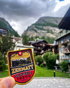 Zermatt patch close-up on a rucksack – retro woven Alpine patch worn in mountain resort