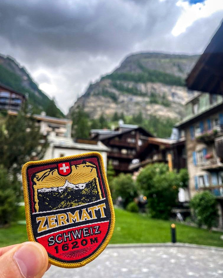 Zermatt patch close-up on a rucksack – retro woven Alpine patch worn in mountain resort