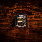 Peak District National Park hard enamel pin - millstones pub sign design, butterfly clasp