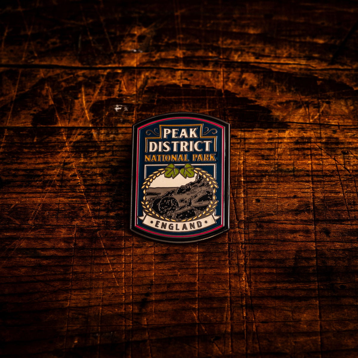 Peak District National Park hard enamel pin - millstones pub sign design, butterfly clasp