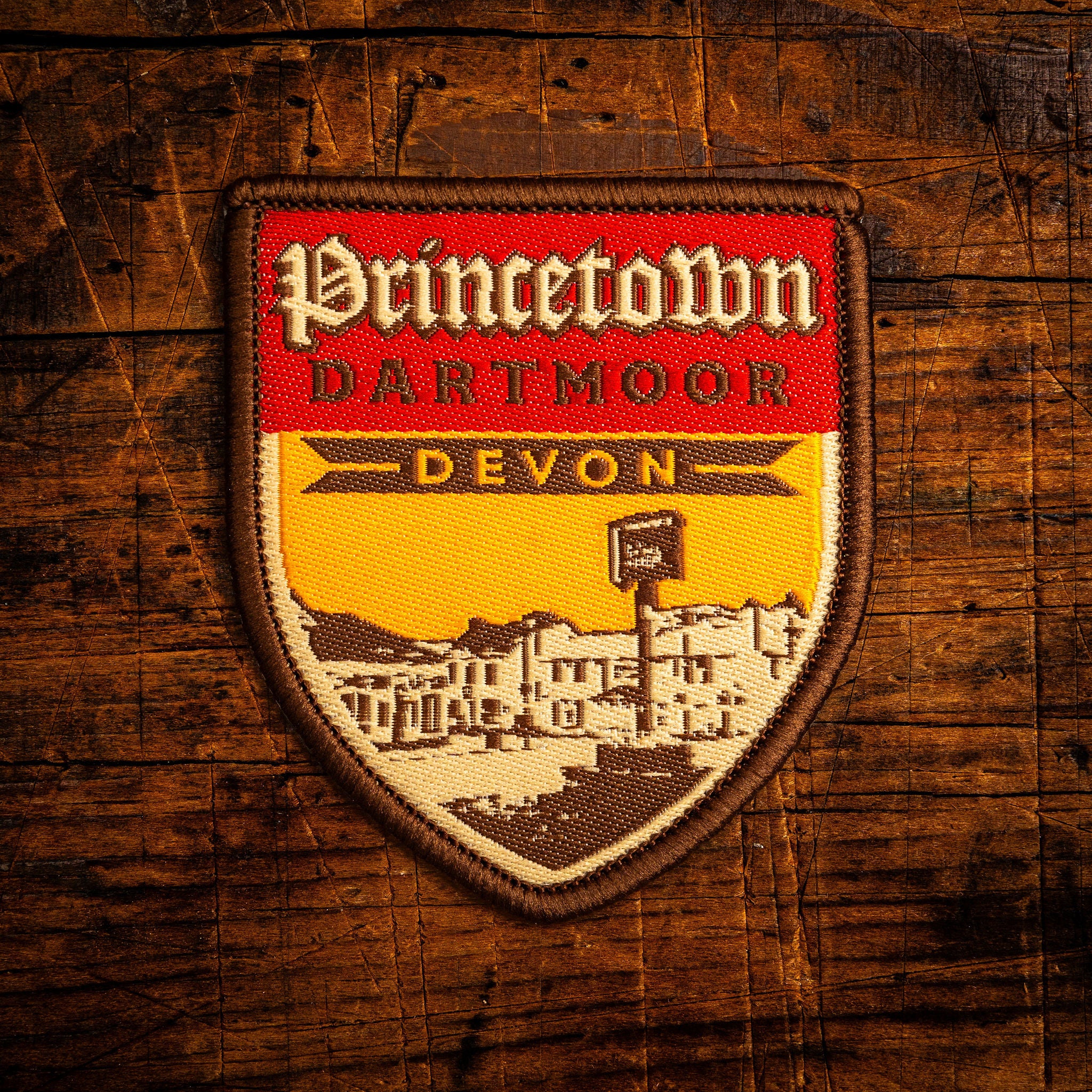 Princetown retro woven patch – village in heart of Dartmoor National Park, iron-on backing, recycled yarn