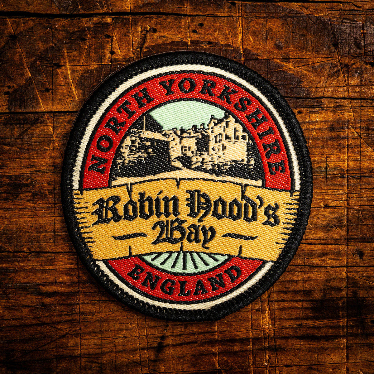 Robin Hood's Bay retro woven patch - famous North Yorkshire coastal village and end of Coast to Coast, iron-on