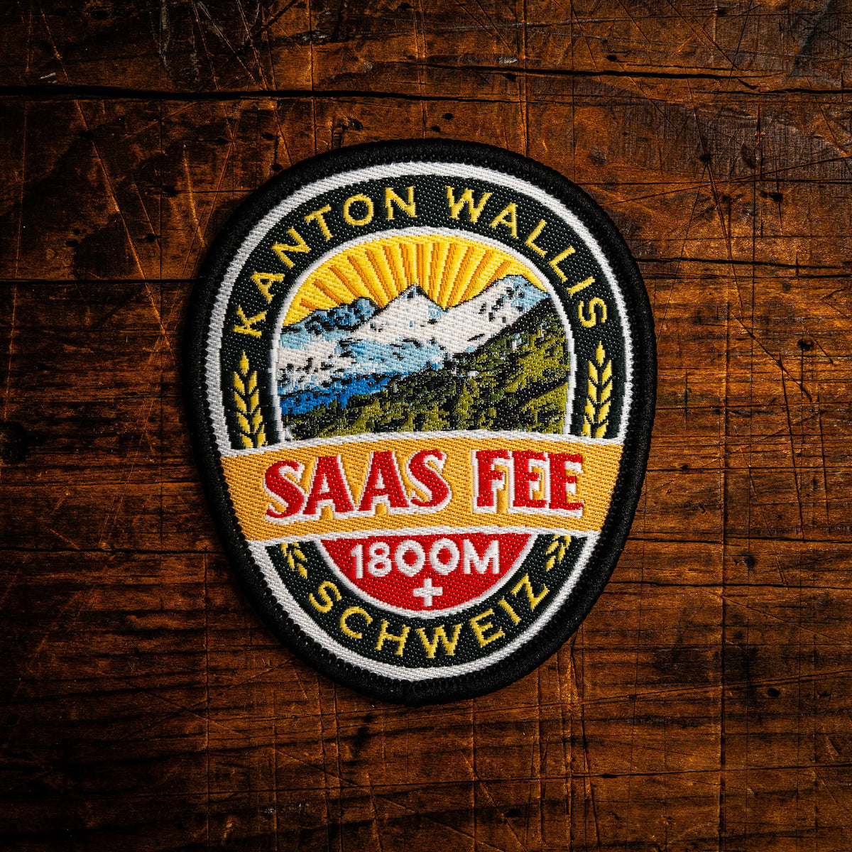 Saas Fee retro woven patch - beautiful Swiss Alpine resort town, iron-on backing, recycled yarn