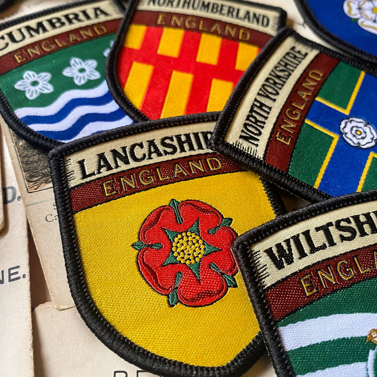 Lancashire county flag patches collection on outdoor gear - retro woven patches