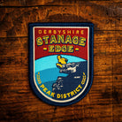 Stanage Edge retro woven patch – famous gritstone escarpment in Peak District, pub sign design, iron-on