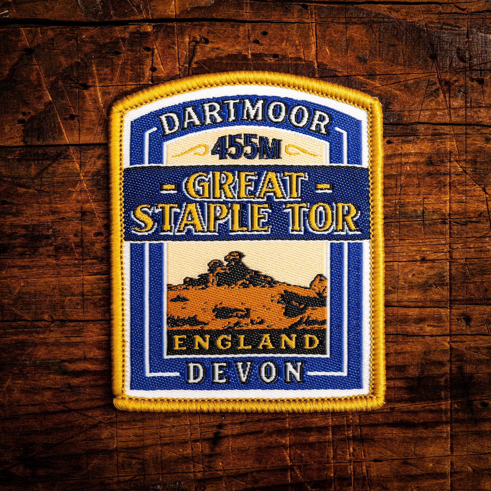 Great Staple Tor retro woven patch – famous Dartmoor tor, iron-on backing, recycled yarn