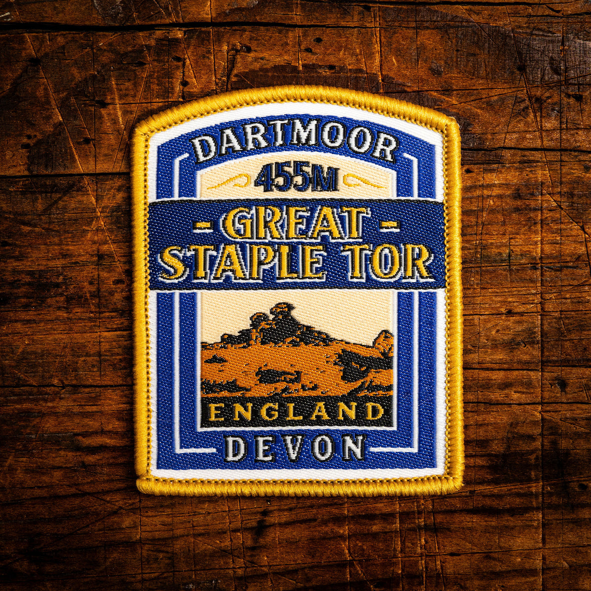 Great Staple Tor retro woven patch – famous Dartmoor tor, iron-on backing, recycled yarn