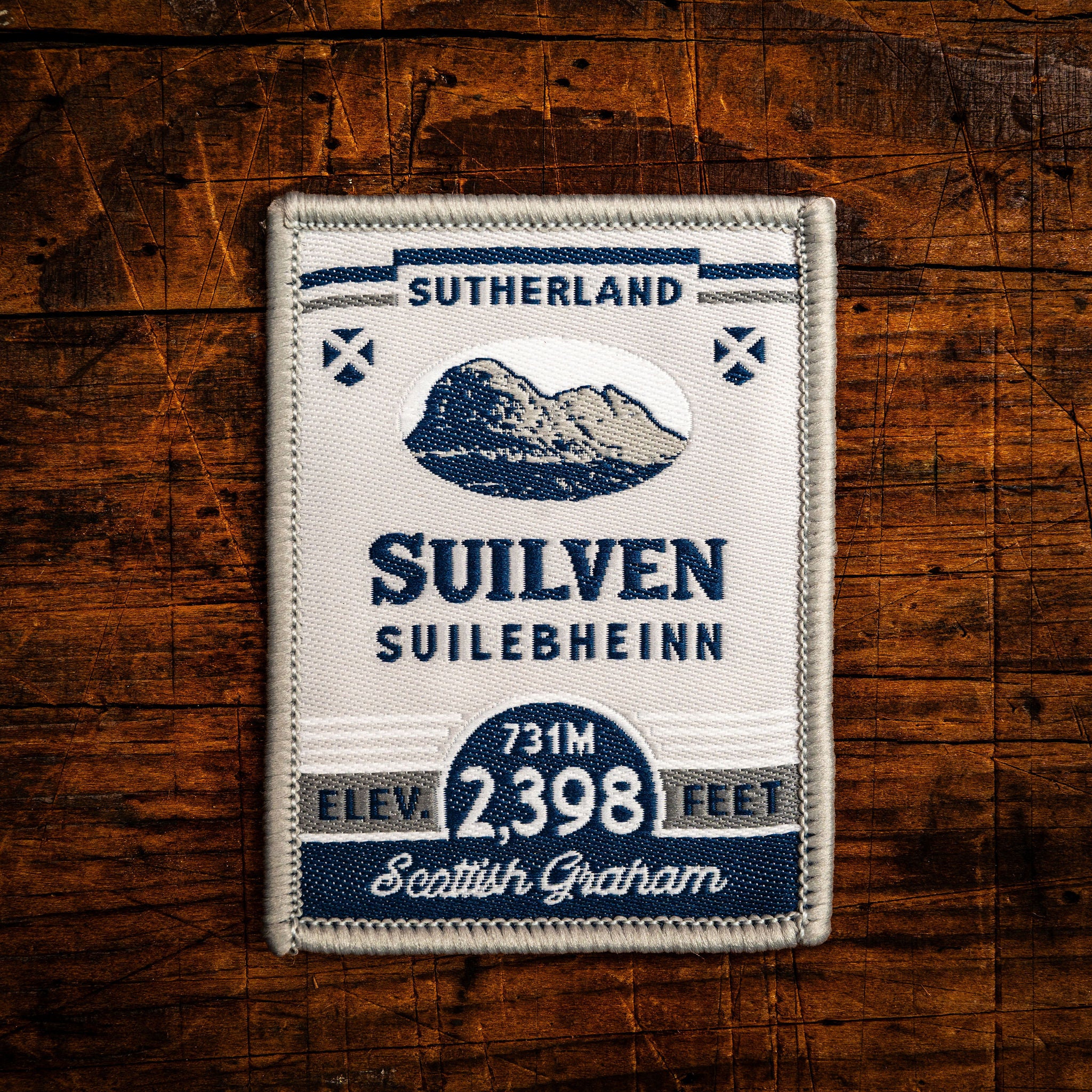 Suilven retro woven patch – iconic Assynt Corbett, Scotland, whisky label design, iron-on backing