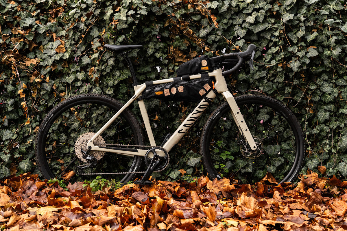 Bikepacking patches lifestyle shot on cycling gear - King Alfred's Way patch included