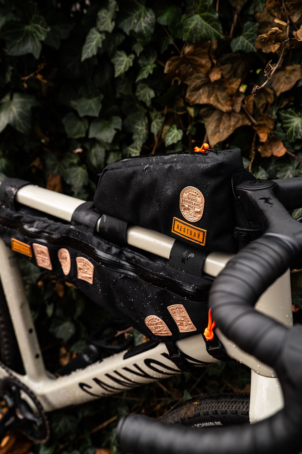 Bikepacking patches collection displayed - retro woven patches for cycling route adventurers
